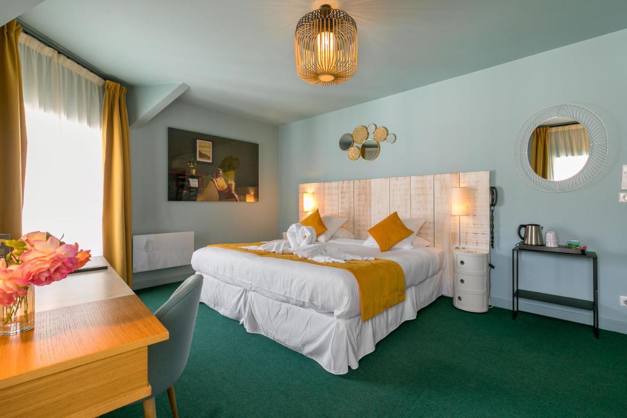 Le Central Boutique Hotel Бон Екстериор снимка